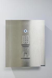 a close up of a microwave oven with a button at Zoder Apartments in Vienna