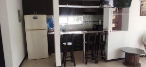 Kuchyň nebo kuchyňský kout v ubytování APARTASOL EN SANTA FE DE ANTIOQUIA + 10 fotografií