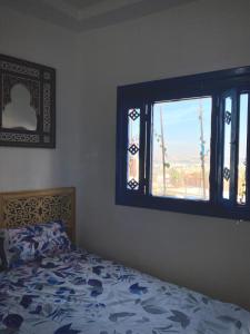 Llit o llits en una habitació de Oudayas Stars