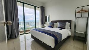 Postel nebo postele na pokoji v ubytování The Penthouse and Suite SGR Melaka