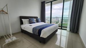 Postel nebo postele na pokoji v ubytování The Penthouse and Suite SGR Melaka