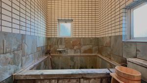 Kopalnica v nastanitvi Villa Hakone Kabuto 古民家旅館 150平米 バス停迄一分 準天然温泉 最大12名