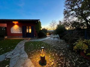 Vonkajšia záhrada v ubytovaní Le Serre Suites & Apartments