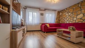 Χώρος καθιστικού στο Apartman Ornela