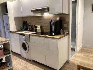 Η κουζίνα ή μικρή κουζίνα στο Superbe appartement proche Paris