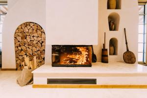 TV a/nebo společenská místnost v ubytování Matca Hotel Relais & Châteaux
