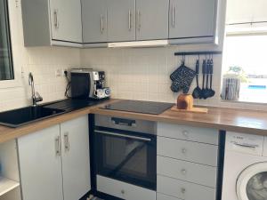 Kuchyň nebo kuchyňský kout v ubytování Villa Eleni