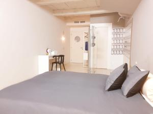Postel nebo postele na pokoji v ubytování Hotel Aracoeli