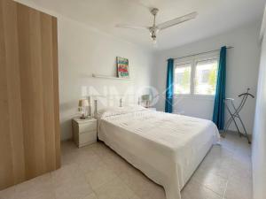 A bed or beds in a room at 2da linea de playa, WIFI y aire acondicionado 107B - INMO22