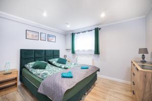 Posteľ alebo postele v izbe v ubytovaní Apartamenty Jelitkowska 13,Gdańsk Jelitkowo, 100m od morza