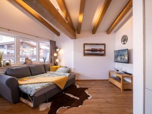 Televízia a/alebo spoločenská miestnosť v ubytovaní Appartement Torblick
