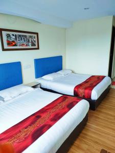 Postel nebo postele na pokoji v ubytování HOTEL YTS