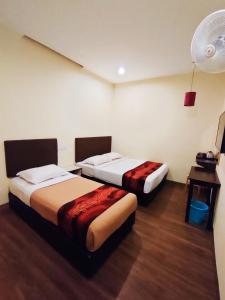 Postel nebo postele na pokoji v ubytování HOTEL YTS