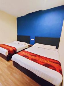Postel nebo postele na pokoji v ubytování HOTEL YTS
