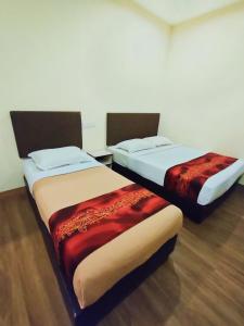 Postel nebo postele na pokoji v ubytování HOTEL YTS