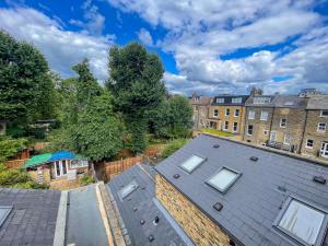 an overhead view of a roof with buildings in the background at 1 Bed Attic Flat with Easy Reach to City Centre in London