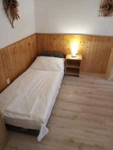 Ένα ή περισσότερα κρεβάτια σε δωμάτιο στο Apartment Zapart Harrachov