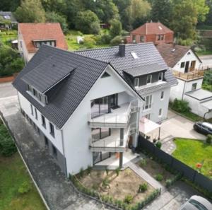an aerial view of a white house at The Ferienwohnung in Bremen
