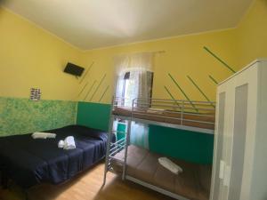 Posteľ alebo postele v izbe v ubytovaní La Foresteria
