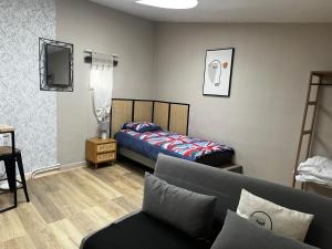 Postel nebo postele na pokoji v ubytování DOUAI 3 Joli studio face à la gare