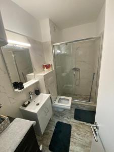 Kúpeľňa v ubytovaní Apartman Dunja
