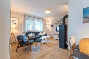 Posezení v ubytování Ferienhaus "Am Kiefernwäldchen"