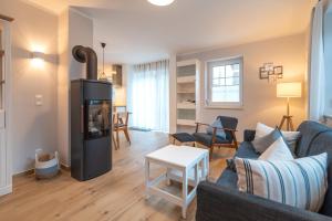 Posezení v ubytování Ferienhaus "Am Kiefernwäldchen"