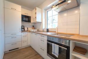 Kuchyň nebo kuchyňský kout v ubytování Ferienhaus "Am Kiefernwäldchen"