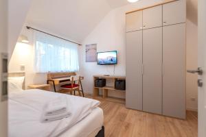 Postel nebo postele na pokoji v ubytování Ferienhaus "Am Kiefernwäldchen"