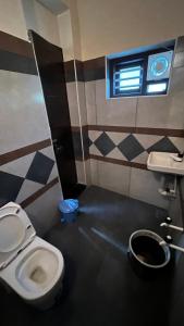 Ванная комната в Welldone Wayanad Holidays