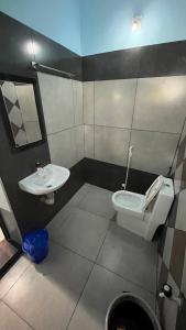Ванная комната в Welldone Wayanad Holidays