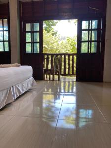 Кровать или кровати в номере Garden View Resort Tonsai