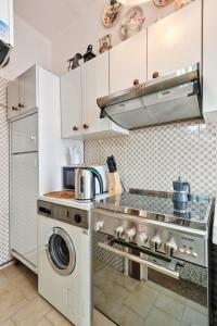Kuchyň nebo kuchyňský kout v ubytování Santa Marina Venice Apartment