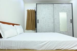 Krevet ili kreveti u jedinici u objektu MSR Guest Inn NELLORE