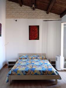 เตียงในห้องที่ Guest House Beati Paoli