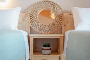 Postel nebo postele na pokoji v ubytování Pithari Stone Villa