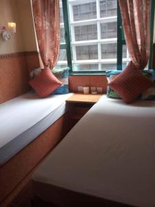Voodi või voodid majutusasutuse Toronto Guest House toas