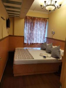Voodi või voodid majutusasutuse Toronto Guest House toas