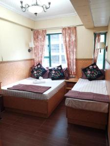Voodi või voodid majutusasutuse Toronto Guest House toas