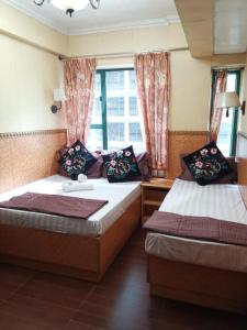 Voodi või voodid majutusasutuse Toronto Guest House toas
