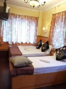 Voodi või voodid majutusasutuse Toronto Guest House toas