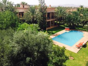 Vue sur la piscine de l'établissement Murano Resort Marrakech ou sur une piscine à proximité