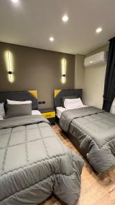 Lova arba lovos apgyvendinimo įstaigoje Luxury apartment El Mohandessen