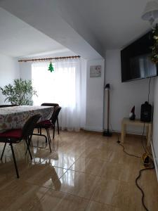 TV a/nebo společenská místnost v ubytování Casa Zura