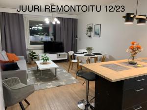 Restoran või mõni muu söögikoht majutusasutuses StarHomes 2 BR City Apartment