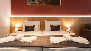 HA Hotel Mostar客房内的一张或多张床位