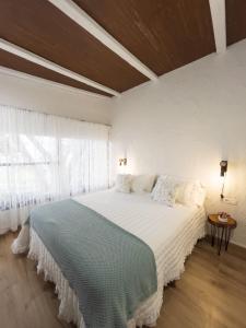 Posteľ alebo postele v izbe v ubytovaní Casa Rural Venus