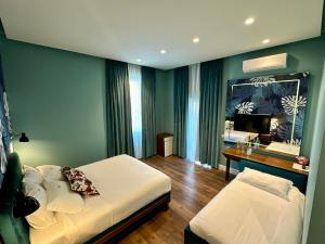 Le Palazzine Hotel客房内的一张或多张床位