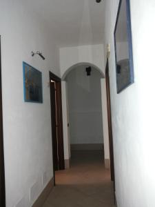 Televízia a/alebo spoločenská miestnosť v ubytovaní Hotel Villa Ionia