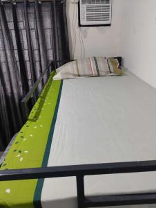 Ein Bett oder Betten in einem Zimmer der Unterkunft Vin's Place Rentals